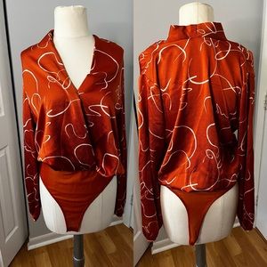 Stylish terracotta colored body suit - size M